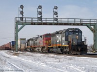 After completing some non-rail related diversions, the first train of the day was a pretty good omen of what was to follow. I've never before, or since, had such a good or busy day on the Dundas Sub. To get things going, WC 6935, BNSF 794, and WC 6936 lead 148 through Paris Jct., and would soon be called on to drop the BNSF unit off at Brantford to help train 399 that had lost one of it's two units. 1141hrs.