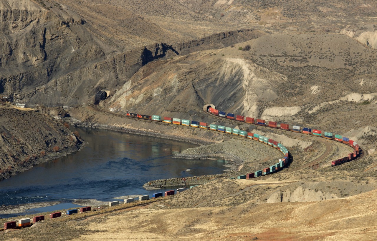 C.P.R. westbound, C.N.R. eastbound at Basque Siding and Black Canyon on Thompson River.