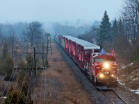 Talk about timing, the CP Holiday Train slows to a stop at Puslinch before taking the siding to meet CP 240.
