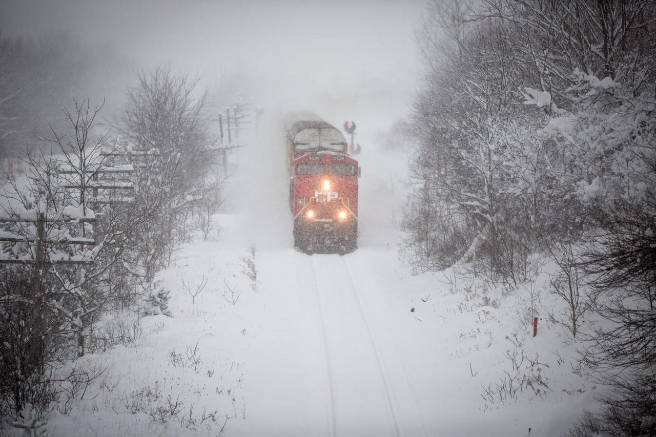CP 8936 pulling autoracks on a snowy morning in London Ontario
