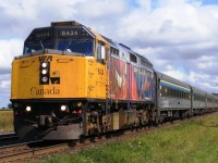 Westbound Via speeds through Princeton on its way to Windsor hauled by 6434 in Spiderman logo.
