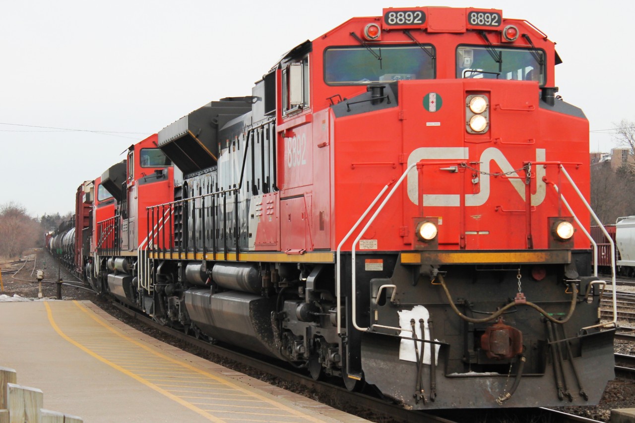 9:17 Eastbound races through Brantford with a mixed freight with the majority being tank cars.
