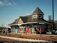 A trip back in time....  I'm just over 1 year old when this picture was taken by an unknown photographer, but when I saw the slide, I had to have it.  It's April 10, 1969 and it appears like everyone is waiting for a westbound CN passenger trains by the way the kids are looking to the east in this picture.  Train order hoops are empty, but neatly placed in front of the Operators window.  I love seeing old pictures from the 60's and 70's when life appears to be so much simpler than it is today.