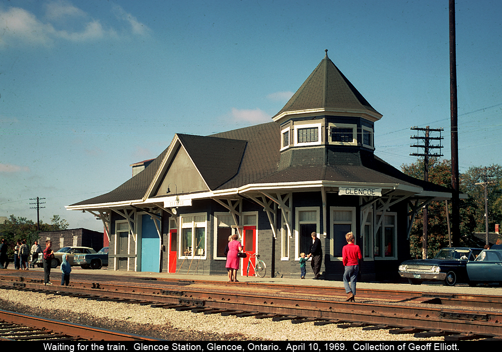 A trip back in time....  I'm just over 1 year old when this picture was taken by an unknown photographer, but when I saw the slide, I had to have it.  It's April 10, 1969 and it appears like everyone is waiting for a westbound CN passenger trains by the way the kids are looking to the east in this picture.  Train order hoops are empty, but neatly placed in front of the Operators window.  I love seeing old pictures from the 60's and 70's when life appears to be so much simpler than it is today.