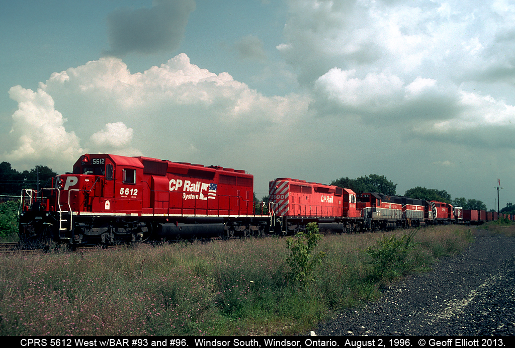 CP 5612, in fresh "Dual Flags" paint, leads train #503 as it pauses at Windsor South for the signal to drop down into the tunnel to Detroit.  Along for the ride today are Bangor and Aroostook dual-control GP38's #93 and #96 as well as a brand new Dr. Pepper trailer coming out of Montreal.  You just never knew what you might see at "The Hub".....