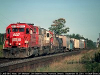 SOO LINE SD40-2 #6612 leads to younger SD60 sisters around the connection track at "CP Melrose" on the CN Strathroy subdivision.  CP swung a deal with CN to run a couple trains in each direction via CN from Melrose to Chicago back in the early 2000's a practice that I'm sure Hunter Harrison would love to pull off now on a grander level so as to not have to spend money on a larger tunnel in Windsor!!