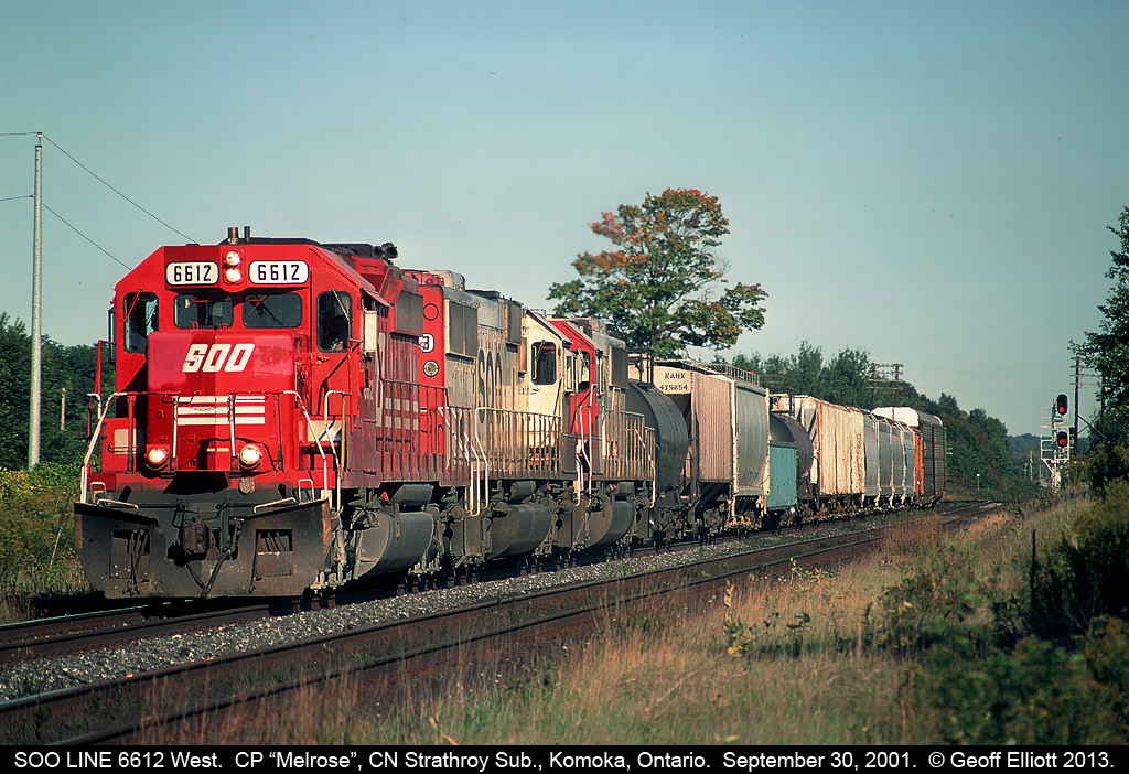 SOO LINE SD40-2 #6612 leads to younger SD60 sisters around the connection track at "CP Melrose" on the CN Strathroy subdivision.  CP swung a deal with CN to run a couple trains in each direction via CN from Melrose to Chicago back in the early 2000's a practice that I'm sure Hunter Harrison would love to pull off now on a grander level so as to not have to spend money on a larger tunnel in Windsor!!