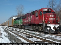 Since there have been a lot of posts of CP 6257 lately here is the "pre-rebuild" version.  SOO LINE 6057 and HLCX 7003 are tied down in the siding in Belle River, Ontario waiting on a crew.  This seemed to be a regular practice for a while as they would be eastbound trains to Belle River and park them for up to 2 days waiting on a crew.  Never found out why they did this.