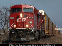 With the eastbound signal at Belle River siding showing in the background, CP 8836 west high-balls past the 'Belle River' mileboard on it's way to Windsor.