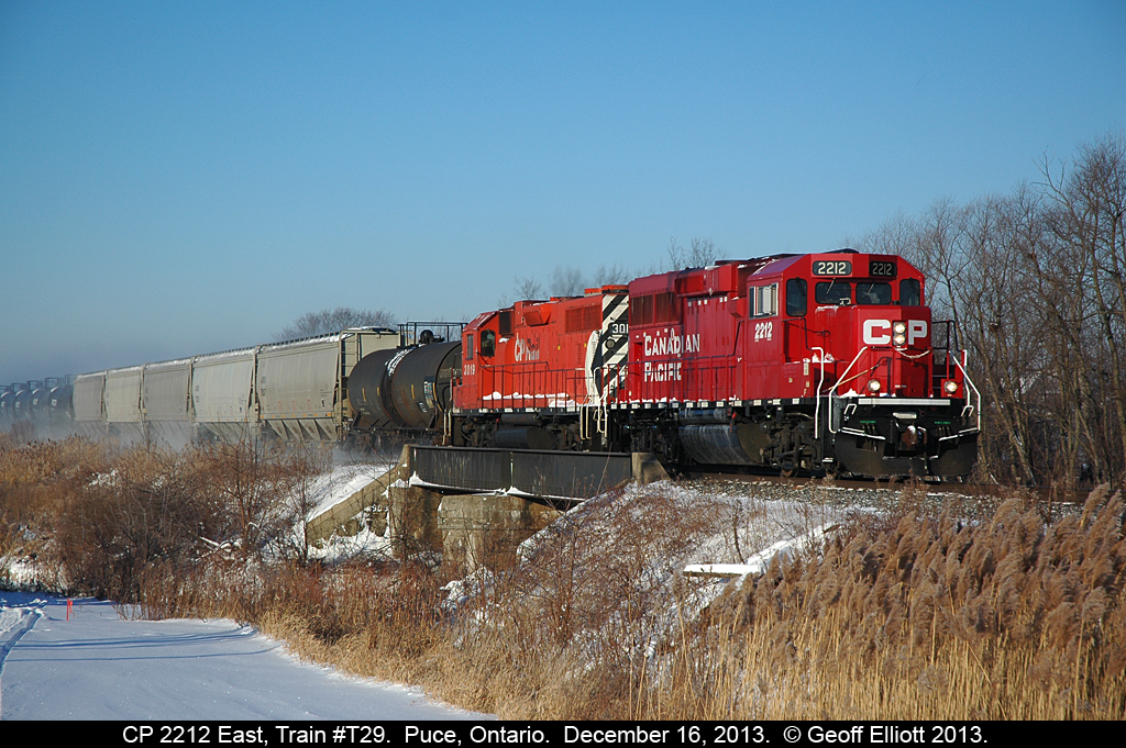 CP GP20C-ECO #2212 is still working the Windsor to Chatham local, train T-29, as it rolls over the Puce River Bridge on a -17C morning.  Lucked out here as I was shooting VIA #72 and both trains left Windsor at the same time.  Luckily T29 had to switch a customer in Elmstead which held him off just long enough for me to shoot both trains before heading home to warm up!!