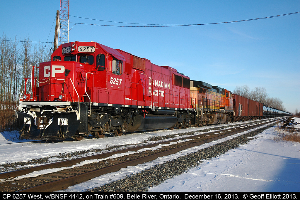 CP 6257 and BNSF 4442 pause in the siding in Belle River, Ontario to allow a couple eastbounds to pass. I'm sure this won't be the only pic on Railpictures.ca of this train in Belle River as I know Jay Butler was leaving the siding just as I arrived....  :-)