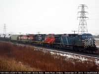 It's a dismal day at best so I decided to just walk out in my back yard and grab a shot as it went by.   Here CP 641-093 rolls by with a rare consist for the CP in CEFX 1052, CN 2597 and BCOL 4622.  The CN and BCOL units were both Dead-in-tow on this guy as they went by me.  Glad I didn't have to stand out in the rain for too long.  Thanks Jay for letting me know he was in Tilbury....
