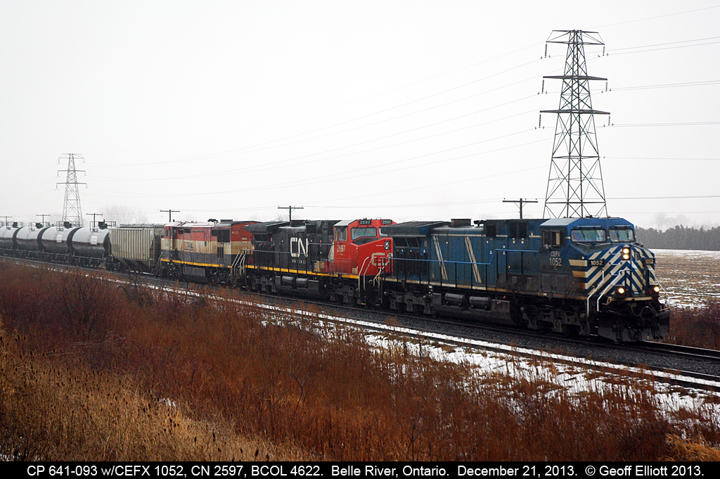 It's a dismal day at best so I decided to just walk out in my back yard and grab a shot as it went by.   Here CP 641-093 rolls by with a rare consist for the CP in CEFX 1052, CN 2597 and BCOL 4622.  The CN and BCOL units were both Dead-in-tow on this guy as they went by me.  Glad I didn't have to stand out in the rain for too long.  Thanks Jay for letting me know he was in Tilbury....