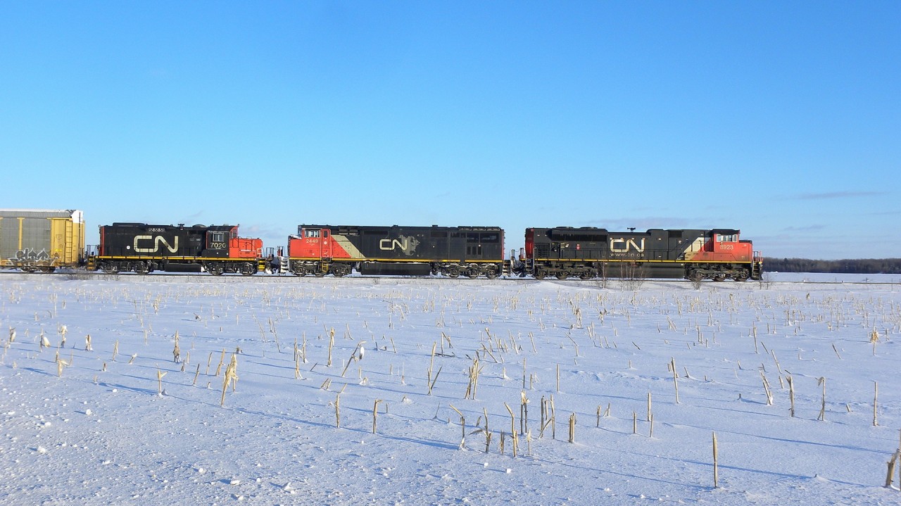 CN 401 passes amid the snow covered corn fields.