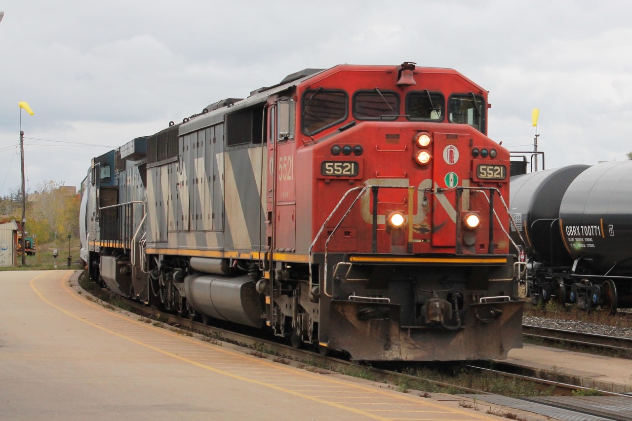 Eastbound mixed freight races through Brantford.
