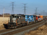 GCFX SD40-3 6077, NS B40-8 4803 and CN SD75I 5779 rocket through Clarke West with daily Halifax-Toronto train Q149.