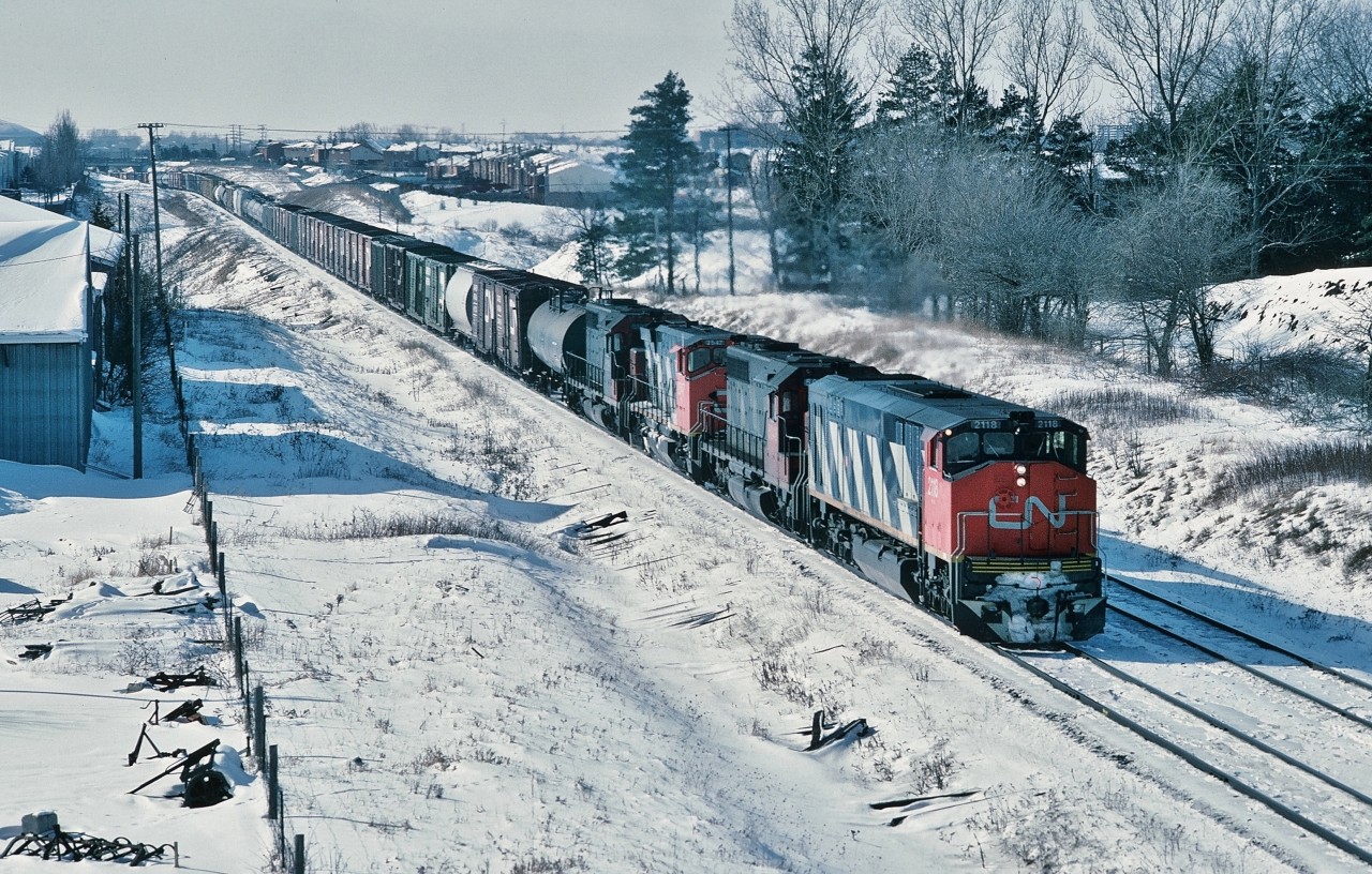 Elephant Style: How 'bout this for variety: Four Units Three Builders Three Models


Eastbound (?) CN mixed freight on the York Sub clearing Doncaster 


Powered by  #2118 – 50xx – 2547 – 5xxx  ( BBD  HR616  -  GMD SD40  -  MLW M420(W)  -  GMD SD40  )


Luv those Zebra stripes !


Jan 26 1985 Kodachrome by S. Danko


More BBD:


 Rust Buster !   


 York Sub
