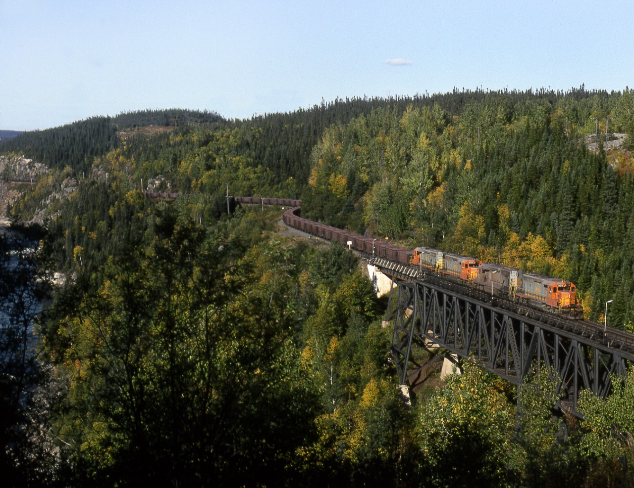 Southbound Ore loads cross the Moisie River approximatly 10 miles north of the Terminal at Sept Iles.