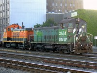 A pair of BNSF SW1200's (3534, 3536) doing some switching near the container ports in downtown Vancouver, BC. From the collection of Rick Gardiner