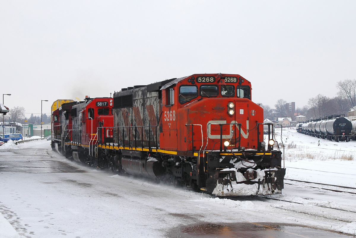 382 comes through Brantford with CN 5268 - GTW 5817 - CN 2106 and 96 cars