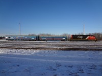CN 5319 is connected and ready to move CN 15007 & CN 15008 TEST cars on the Camrose Sub. on this cloudless and bitterly cold November 15th. CN's Engineering crews do a remarkable job of keeping their TEST trains clean and neat as they traverse Canada and the United States on a never ending track inspection program.