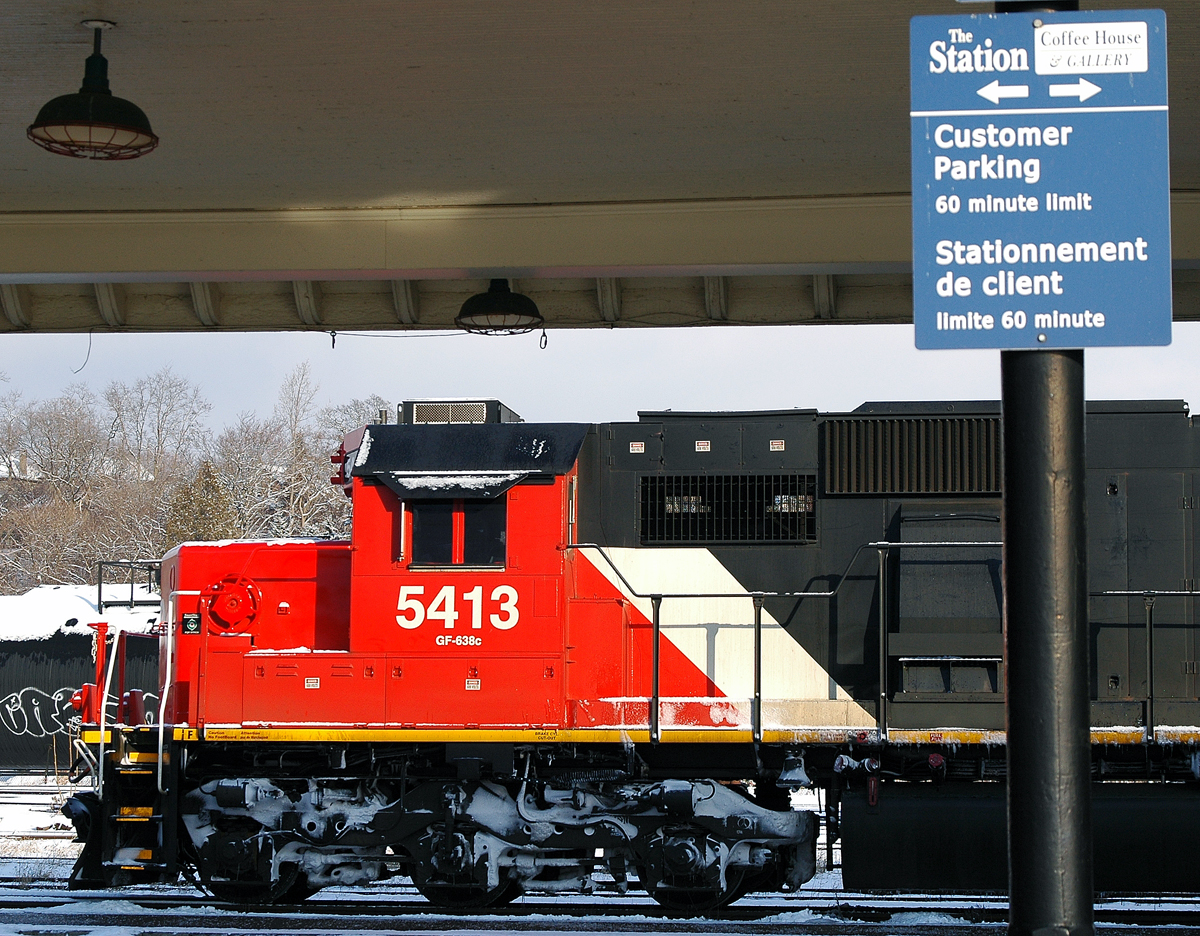 A broken down CN 5413 sitting dead with 145 at the Brantford VIA station. It will finally be back on the move later in the afternoon once it get's a unit from CN 383