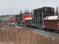 Having rotted in the siding at Pine Orchard for about two hours to meet five southbound freights, CN 2560 and 2620 have 301's train on the main at Zephyr to meet CN 2253 leading a 114 into the siding. Have to hand it to 301's crew as they were exceptionally gracious after being told they'd meet three, then four, and finally a fifth at Pine Orchard, plus three more somewhere south of Washago. 1325hrs.