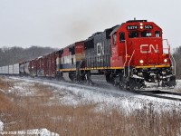 Having just met VIA #1 at Zephyr, CN 412 has slowed down in order to avoid having to stop as 301 enters the siding at Pine Orchard ahead. CN 5474 and BCOL 4623 power the first of five southbounds that 301 will meet at Pine Orchard, 412, 112, 114, 302 and 104. At least this very patient crew will get the main at Zephyr for another 114, and a 314 at Pefferlaw. Not sure who got the siding at Brechin East when they met 874. 1110hrs.

I have never seem this much action on the Bala in one day, let alone a short winter's day. In the space of five hours I shot 10 freights (CN 412, 112, 114, 302, 104, 301, a second 114, 314, 874, 107) and one passenger (VIA 1). Must have been some weather related delays up north.