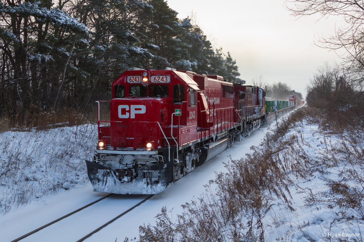 An SD6Deece Leader!. CP 6243 charges train 142 through the slight grade at Flamborough on the Hamilton Subdivision. Seeing stack trains traverse the Ham Sub (once again) is a real treat in itself, but the SD60 leader made it that much better.