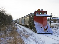 With a longer winter ahead CP 401028 a Russell style plow is hauled to Toronto Yard possibly for service on T07.