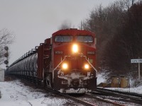 CN U711 climbing the grade out of Brantford with CP 9500 (leased to BNSF) leading the 97 car train