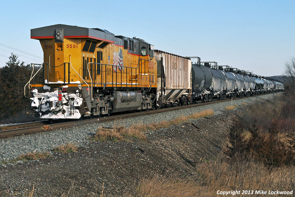 Union Pacific 5501 brings up the rear of CP train 608 near Forest Mills, Ontario. 1128hrs.