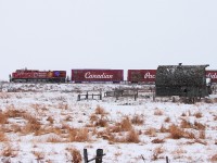 CP's Holiday Train rolls by the old barn at Esmond.