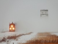 CP's Holiday Train blasts by the elevator at Meadows. This will all likely be the last Holiday Train photo I will ever get by this elevator since the rumor is it will be torn down sometime in 2014.