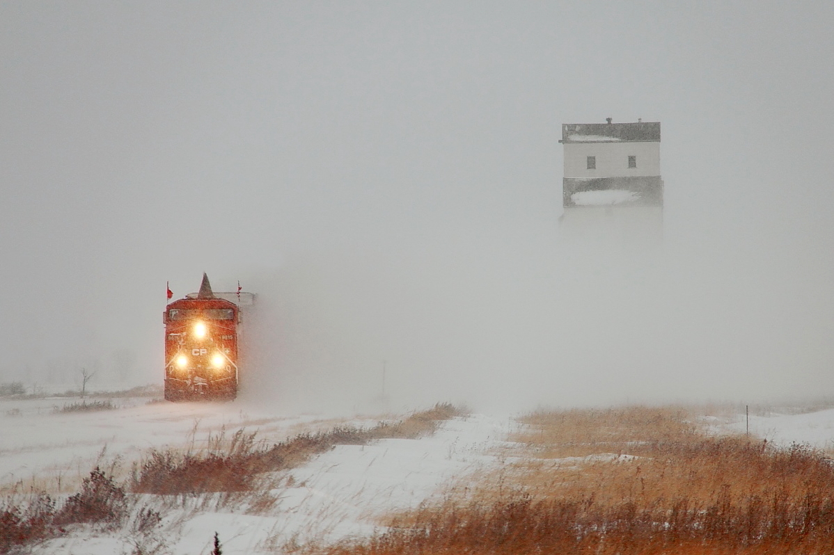 CP's Holiday Train blasts by the elevator at Meadows. This will all likely be the last Holiday Train photo I will ever get by this elevator since the rumor is it will be torn down sometime in 2014.