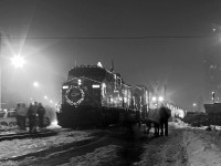 CP's Holiday train makes its' annual London stop on a rather foggy night at the St. George street crossing. The fog and the sodium street lights made for a very yellow-cast scene so I thought I'd try a B&W edit on this one. 