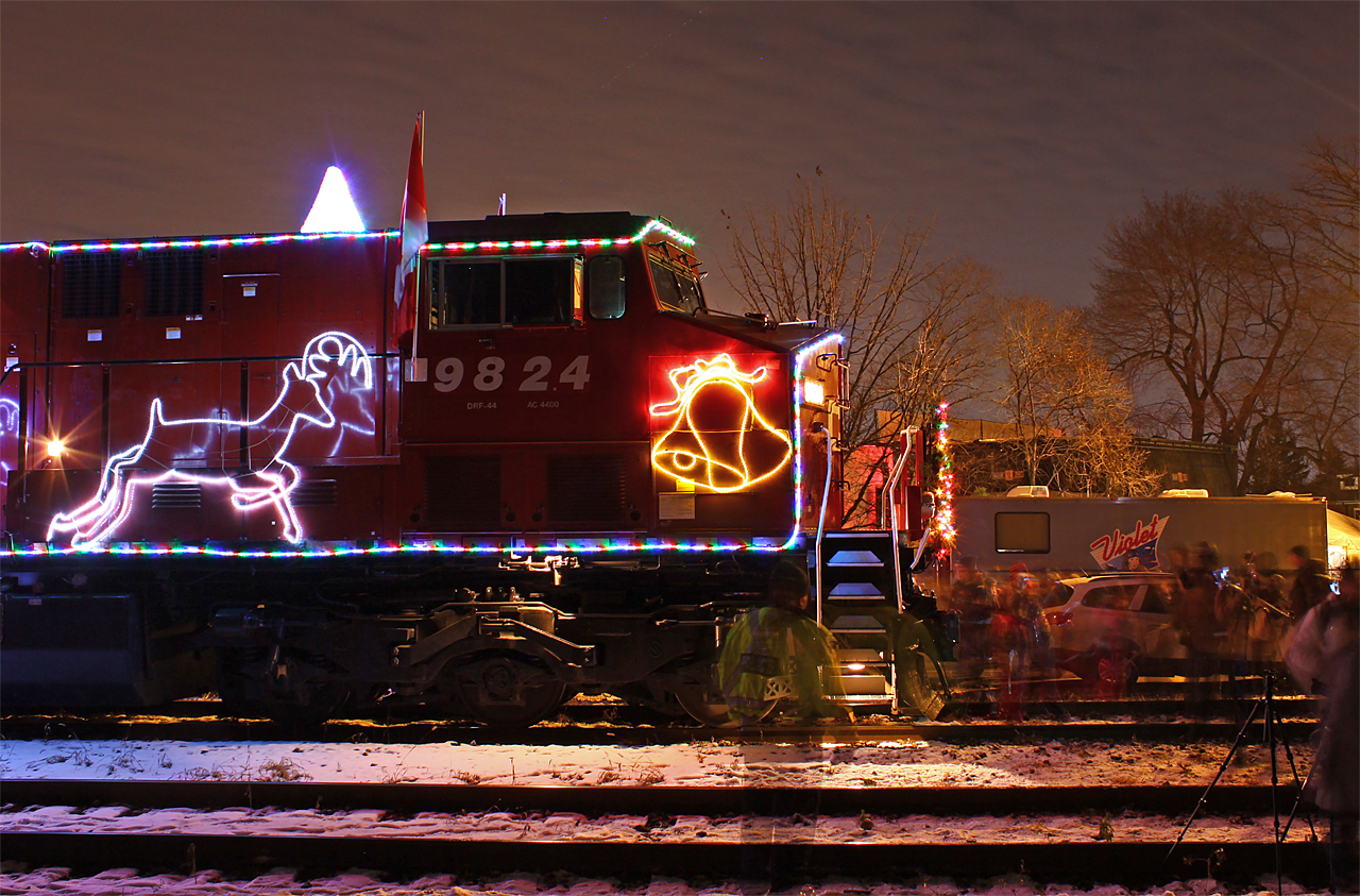 CP's Holiday train sits at the west end of Kinnear yard as Great Big Sea performs on the stage in the distance. I wonder if the crew are GBS fans?