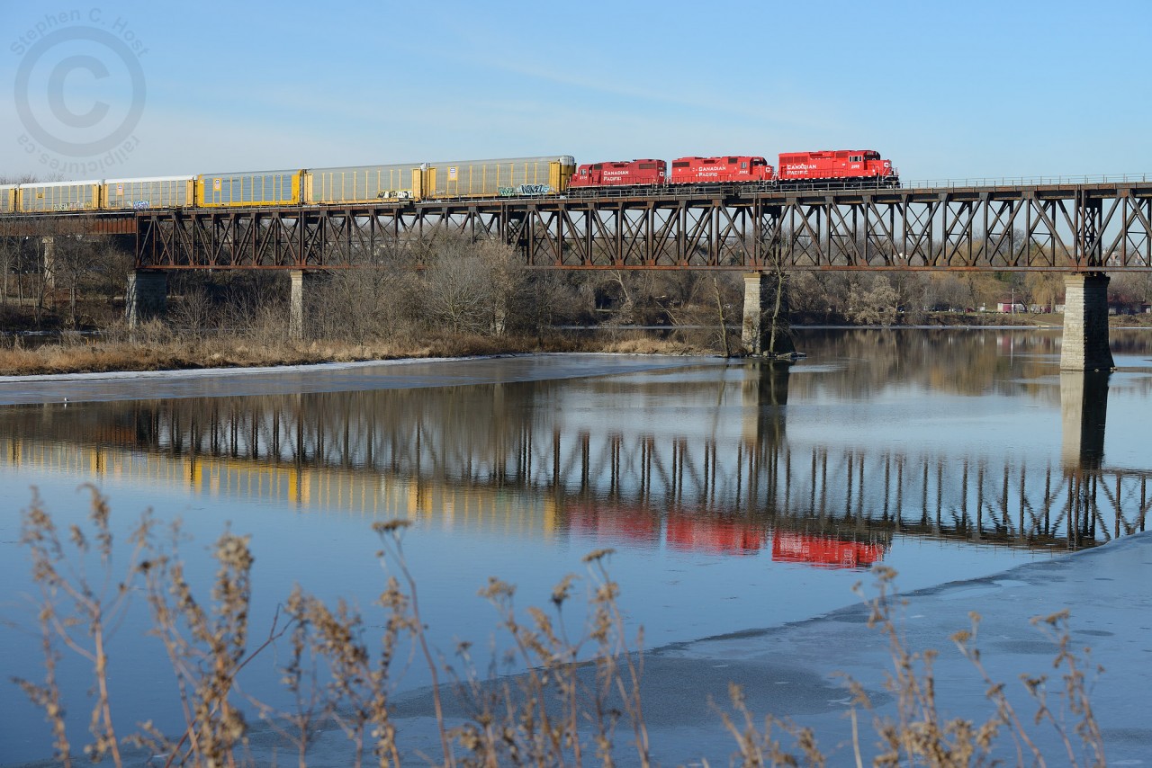 The New Kid on the Block GP20C-ECO 2255 is leading the Hagey/Kitchener turn, crossing the Grand River at Galt. With the GP20C invasion well under way, getting your shots of CP GP9's is highly advised... especially if it's paired with one of the "new kids".