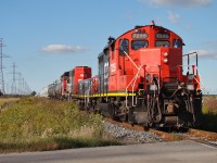 CN 7255, 223 & 9525 have today's local to Terra Industries well in hand as they head south past Courtright Rd., nearly 2/3 of the way into their daily journey south to serve chemical industries that parallel the St Clair River. 