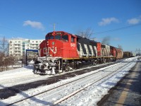 CN-9410 GP-40-2L(w)pulling freight cars from Southwark yard going to Tachereau yard in Montréal these cars have been drop in Southwark yard by CN-rte310 from Belleville Ontario plus cars pick up in the South shore of Montréal
