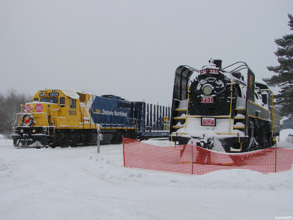 ONR's Christmas train, with decked out 1809 tied down on the main beside recently restored Temiskaming and Northern 701 on display in Englehart. Making their home base out of Englehart for most of the week to do several appearances in the area North and South of town in advance of moving onto Cochrane and places North later this week.