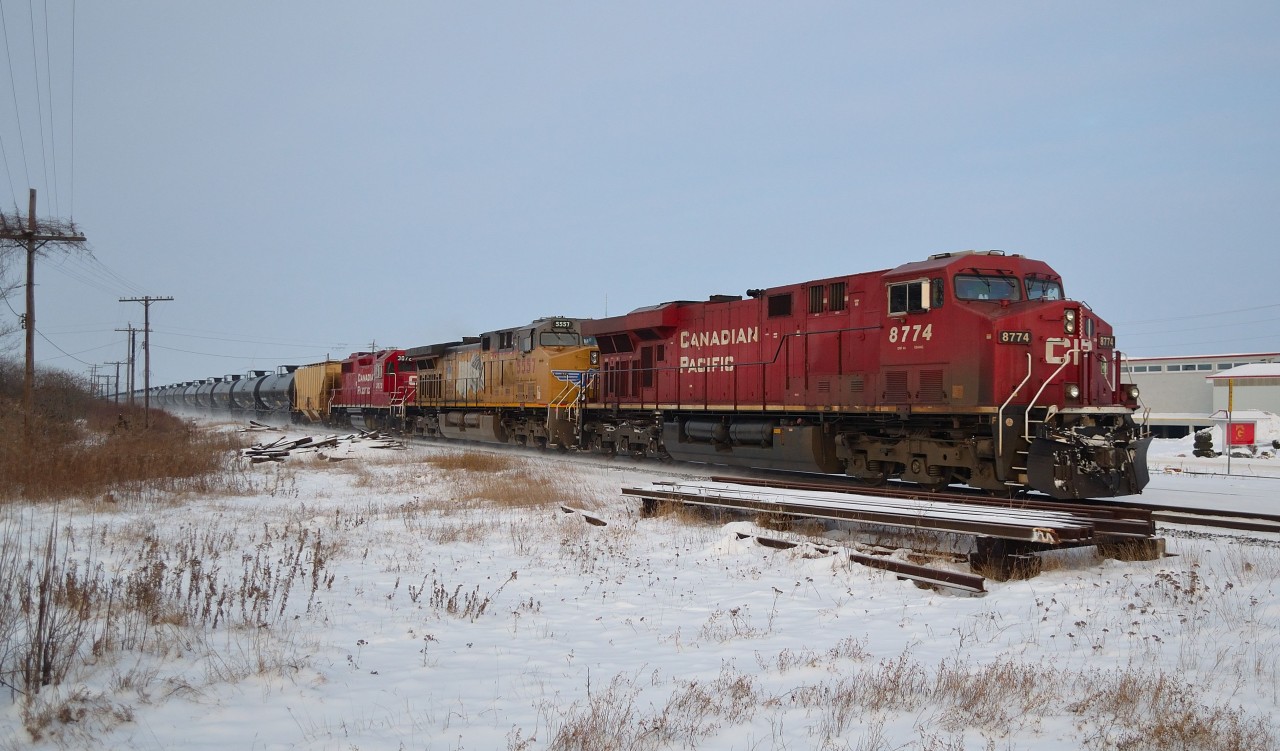 CP 608 passes eastbound thru Tilbury led by CP 8774-UP 5557-CP 3072 on this cold December morning.
