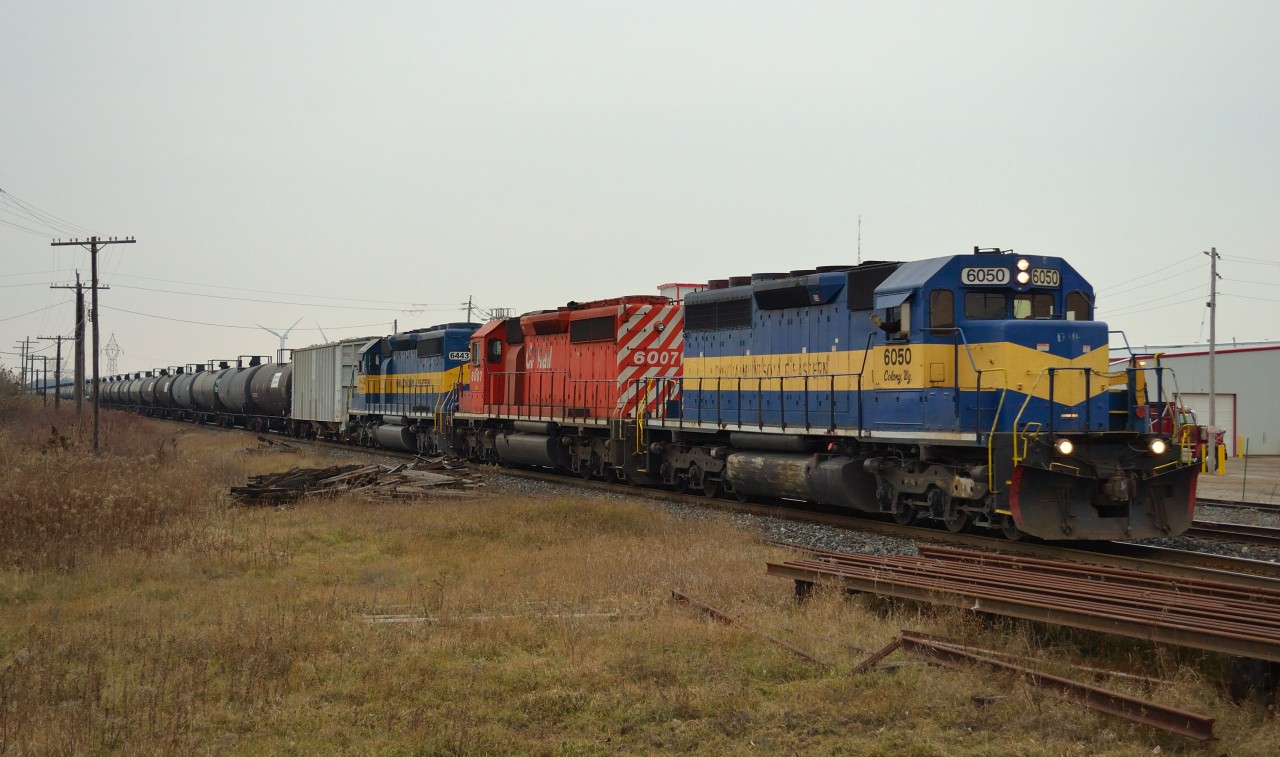CP 640 heads eastbound on a cool cloudy December 1st morning led by DME 6050-CP 6007-ICE 6443 and a wave from our good friend Dave.