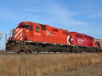 CP T29 led by 3019 & 2212 heads westbound past the Haycroft mileboard on its way toward Walkerville.