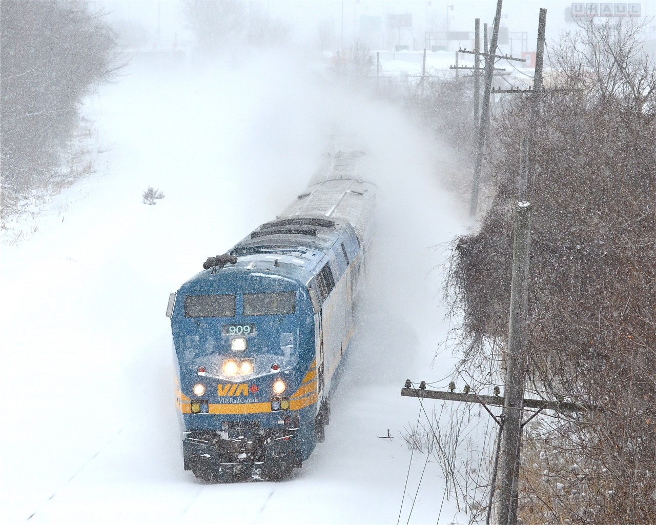 In the midst of a major snowstorm, VIA 61 heads west led by VIA 909. For more train photos, check out http://www.flickr.com/photos/mtlwestrailfan/