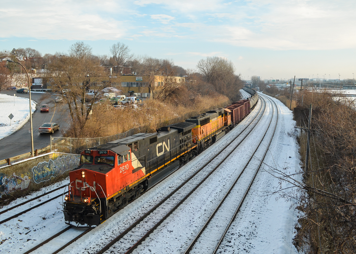 CN 2610 & BNSF 9977 head west through Montreal west with an empty oil train after changing crews at Turcot West. For more train photos, check out http://www.flickr.com/photos/mtlwestrailfan/