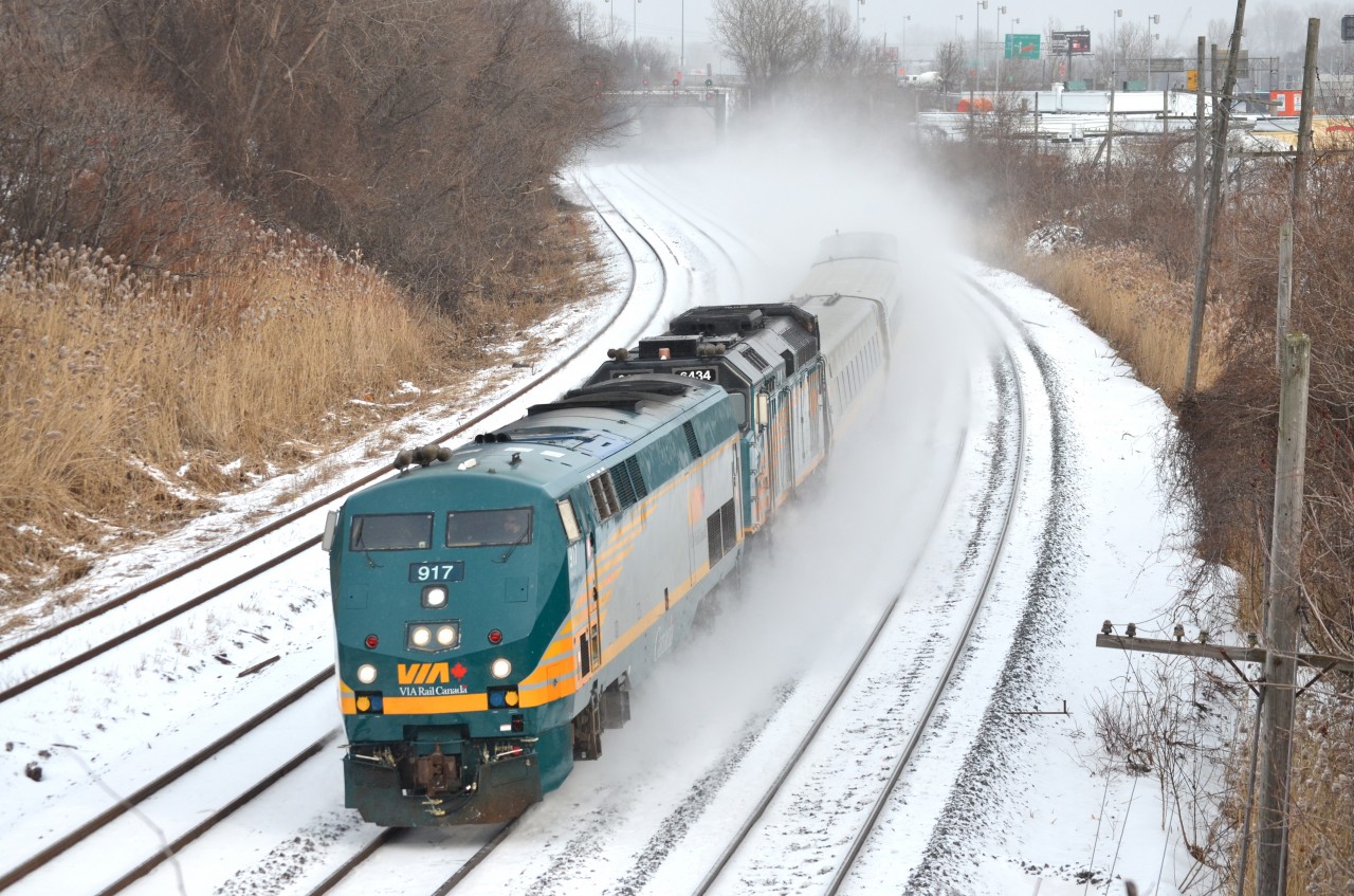 VIA 657 kicks up the snow as it heads west led by VIA 917 & VIA 6434. For more train photos, check out http://www.flickr.com/photos/mtlwestrailfan/