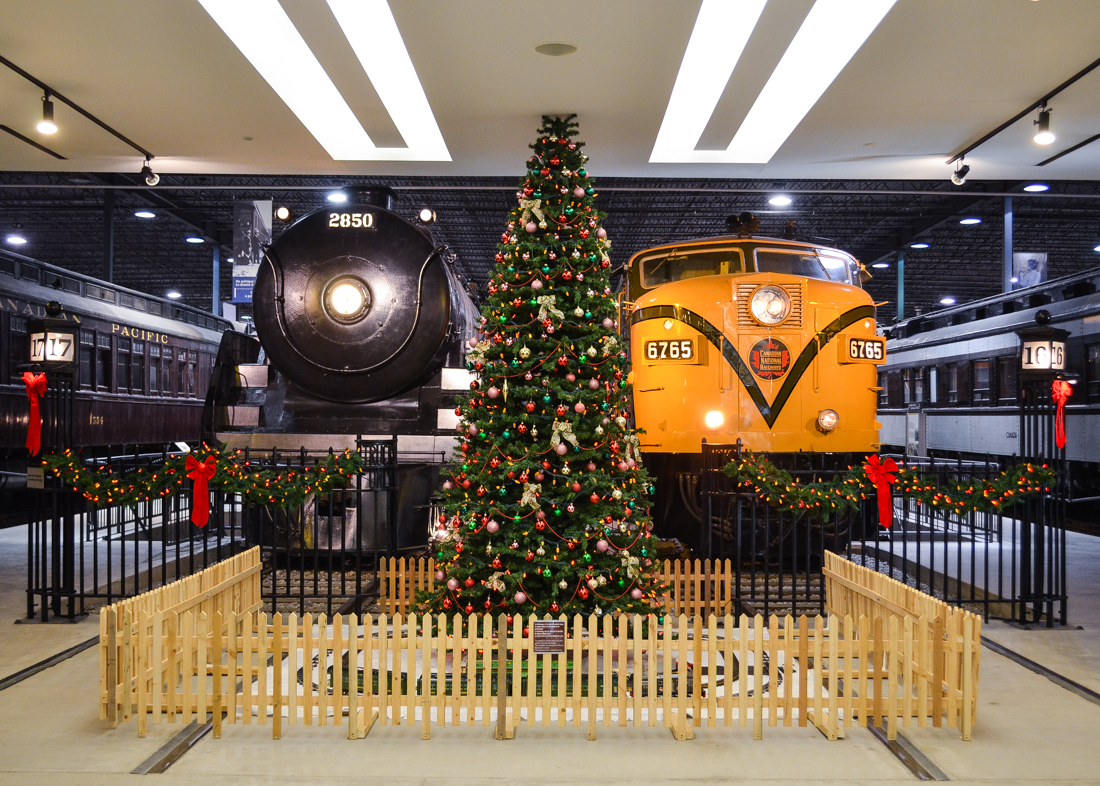 Merry Christmas and happy holidays! CP 2850 (a 4-6-4 Royal Hudson built by MLW in 1938) and CN 6765 (an FPA4 built by MLW in 1958) can be seen on either side of Exporail's Christmas tree and model train exhibit at the entrance to the main hall. For more train photos, check out http://www.flickr.com/photos/mtlwestrailfan/
