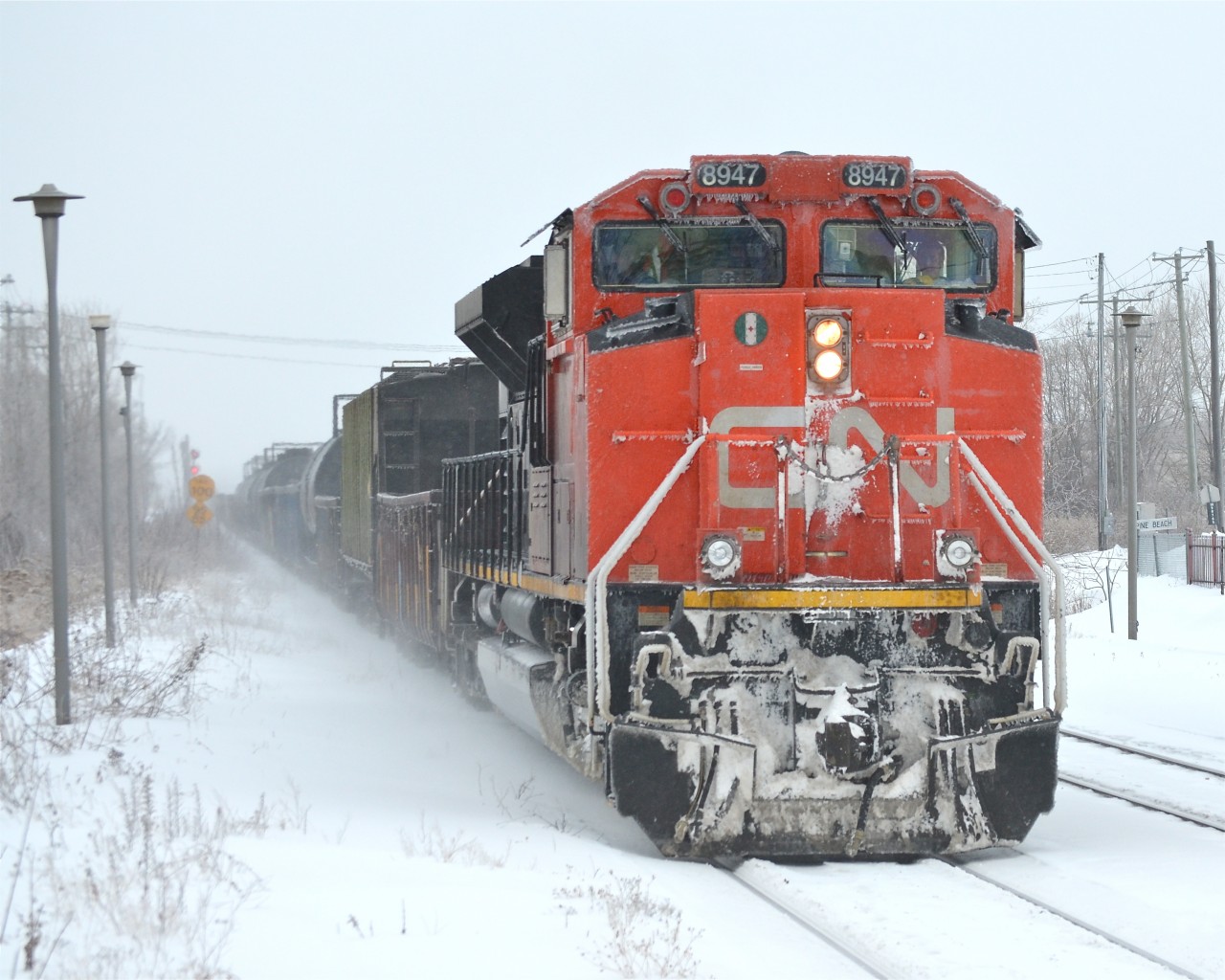 A late CN 310 passes through Dorval with CN 8947 leading and IC 2717 as the DPU. For more train photos, check out http://www.flickr.com/photos/mtlwestrailfan/