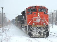 A late CN 310 passes through Dorval with CN 8947 leading and IC 2717 as the DPU. For more train photos, check out http://www.flickr.com/photos/mtlwestrailfan/